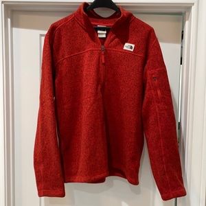 Red North Face fleece sweater